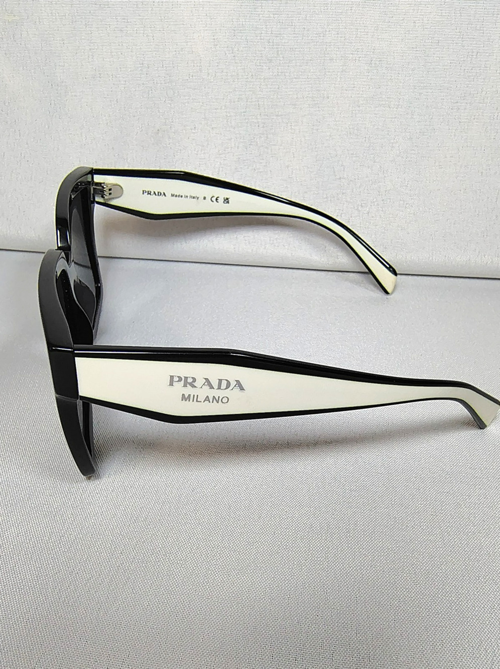 Prada Symbole Sunglasses Black and White Prada Milano Logo